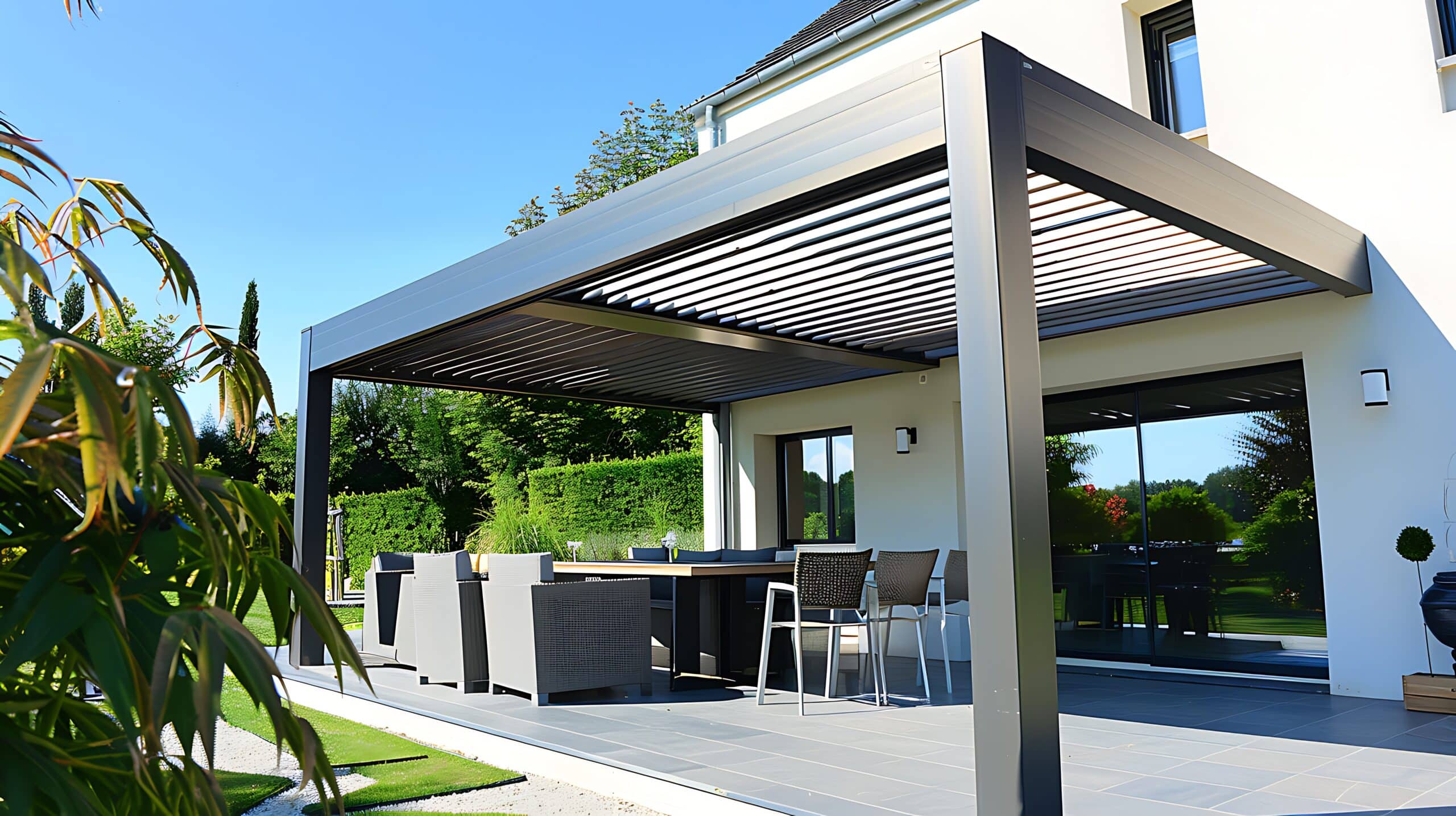 Sleek, modern pergola with adjustable louvers, perfect for controlling sunlight and shade in a minimalist garden setting