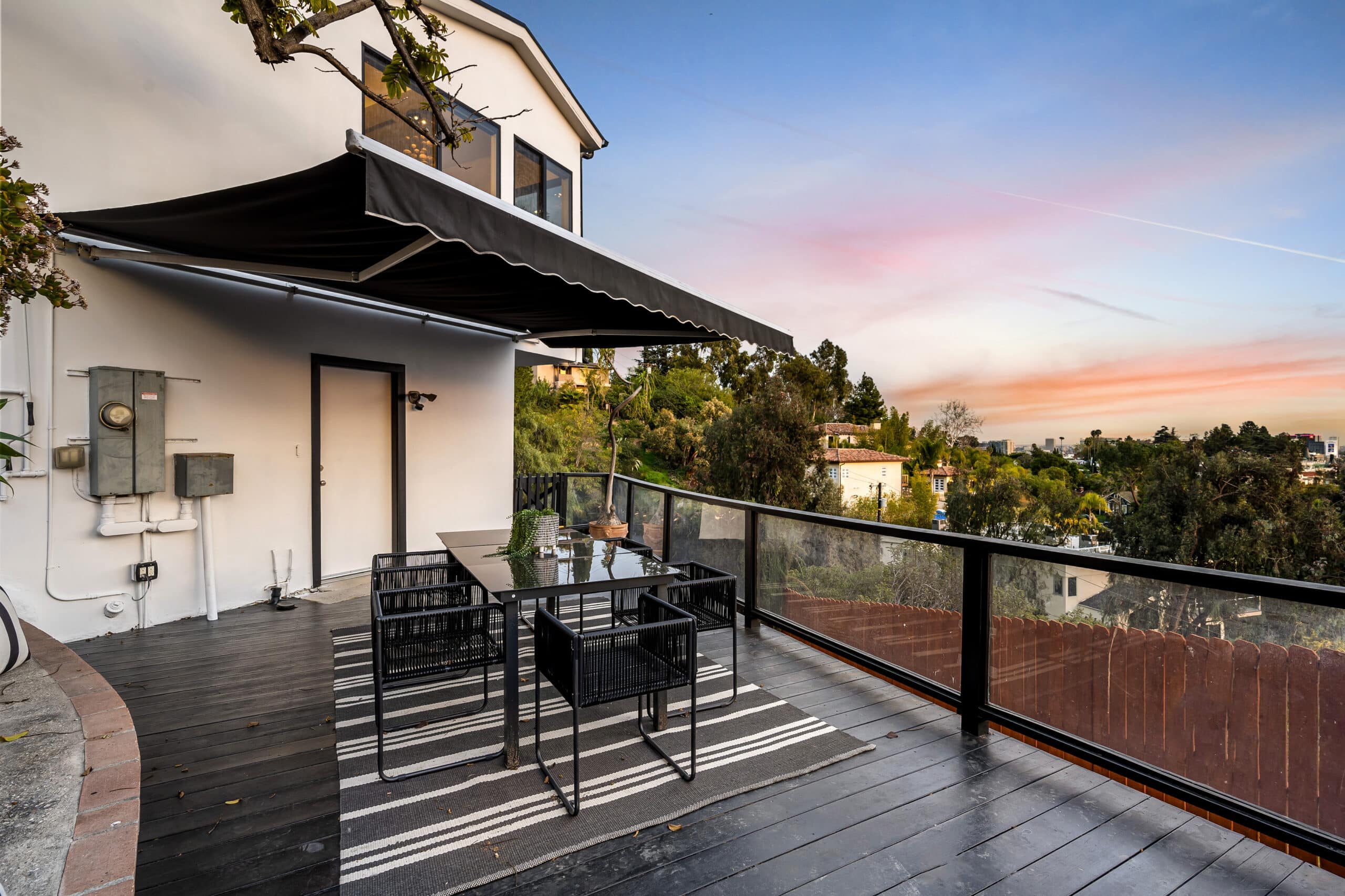 Modern Hollywood Hills home balcony in Los Angeles, California, with a remodel of an older house